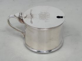 A Victorian silver drum Mustard Pot with beaded rim, the lid engraved initials, London 1899, 98gms