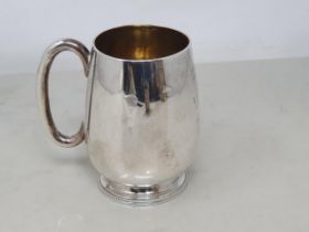 A Victorian silver Christening Mug with beaded rim and presentation inscription, London 1872, Maker: