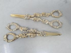 Two pairs of William IV silver-gilt Grape Scissors with fruiting vine decoration, London 1836,