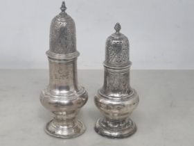 Two George III silver Pepperettes engraved initials, London 1763 & 1773, maker: Robert Peaston,
