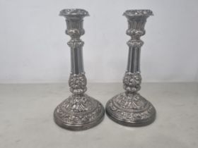 A pair of George IV silver Table Candlesticks with leafage friezes on circular bases, Sheffield