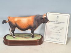 A Royal Worcester Model of a Jersey Bull by Doris Lidner, 11 1/2in, on stand, with Certificate