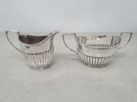 A Victorian silver two handled Sugar Bowl and Jug of oval semi-fluted form, London 1897, 200gms