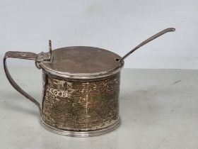 A George VI silver Drum Mustard Pot engraved initial K, London 1828, and fiddle pattern Spoon, 1829,