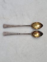 *** WITHDRAWN *** A pair of Russian Faberge silver Coffee Spoons with reeded stems, marked 84, etc