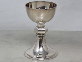 An Edward VIII Arts & Crafts silver Chalice having hexagonal knop stem, rope twist friezes, hammered