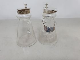 A pair of George V silver lidded Toddy Jars, Sheffield 1909, and one Whiskey Label, London 1907
