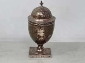 A George III silver Pepperette of urn shape engraved initial K, on square base, London 1802,