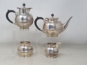 A silver circular four piece Tea and Coffee Service, Birmingham 1951/4, 1475gms all in