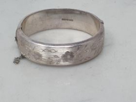 An Elizabeth II silver Bracelet with floral engraving, Birmingham 1967