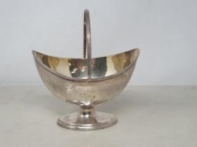 A George III silver oval Sugar Bowl with swing handle on pedestal base, London 1788, maker: Henry