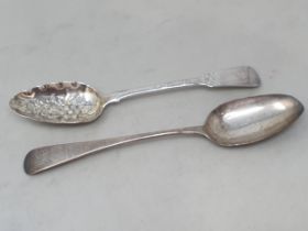 A George III silver Serving Spoon fiddle pattern with floral embossed bowl, London 1809, and a Table