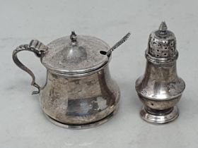 A George V silver Mustard Pot, Birmingham 1922, plus Spoon, and a Pepperette, Birmingham 1901,