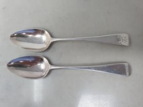 A pair of George III silver Dessert Spoons old english pattern engraved crest and initials, London