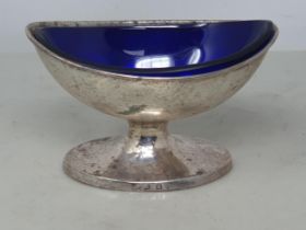 A George III silver oval Pedestal Salt with blue glass liner, circa 1800, 67gms