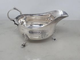A Victorian silver Sauce Boat engraved initials on hoof feet, London 1891, 114gms