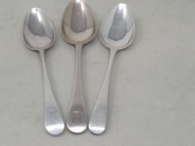 Three various silver Dessert Spoons old english pattern, two with crests, London 1788, 1799 &
