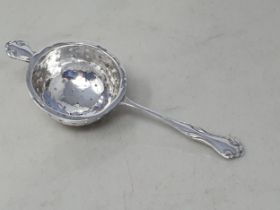 An Edward VII silver Tea Strainer, Birmingham 1907