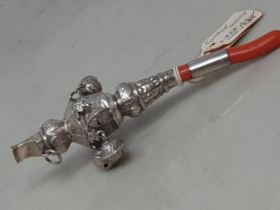 A 19th century silver Rattle with six attached bells and engraved decoration, maker: George Unite