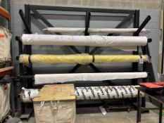 METAL MATERIAL RACK WITH ROLLS OF FABRIC