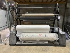 METAL A-FRAME MATERIAL RACK WITH ROLLS OF FABRIC