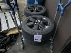 LOT CONSISTING OF: RIMS AND TIRES ON UTILITY CART