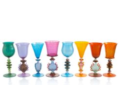 A SET OF 15 LARGE DECORATIVE WINE GLASSES