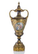 A LARGE GILTBRASS MOUNTED BLUE FOND VASE AND COVER