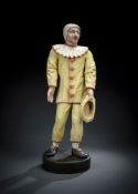 AN ITALIAN WOOD FIGURE OF HARLEQUIN