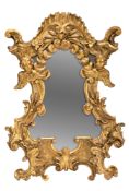 AN ITALIAN CARVED GILTWOOD MIRROR