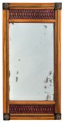 A BRASS MOUNTED PARTLY EBONIZED CHERRYWOOD MIRROR