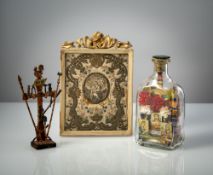 Monastic work, bottle with devotional objects and crucifix with the instruments of torture