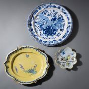 TWO FAIENCE DISHES AND A PLATE