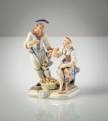 A LUDWIGSBURG PORCELAIN GROUP OF A PAIR OF FRUIT FARMERS