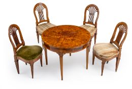 A NEOCLASSICAL WALNUT CENTRE TABLE AND FOUR CHAIRS