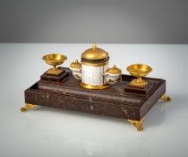 A FRENCH GILT METAL MOUNTED FAUX MARBLE WRITING SET