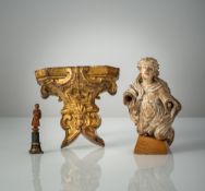 A CARVED AND GILT WOOD MINIATURE CONSOLE; A CARVED ANGEL FRAGMENT WITH STAND AND A SEAL