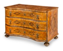 A SOUTH GERMAN BAROQUE BRASS-MOUNTED WALNUT, FRUITWOOD AND BOG OAK MARQUETRY COMMODE