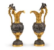 A LARGE PAIR OF NAPOLEON III PAREL-GILT AND PATINATED BRONZE JARS
