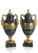 A PAIR OF GILT BRASS AND BRONZE MOUNTED MARBLE VASES AND COVERS