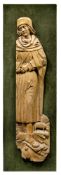 A RELIEF CARVING OF A SAINT - PROBABLY ST. JOSEPH