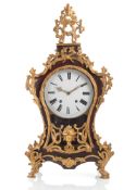 A SWISS GILTBRONZE MOUNTED BURGUNDY-RED PAINTED WOOD PENDULE