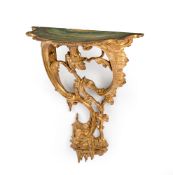 AN ITALIAN GILTWOOD AND POLYCHROME-PAINTED CONSOLE TABLE