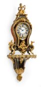 A GILT BRONZE MOUNTED LOUIS XV BOULLE PENDULE AND WALL CONSOLE