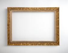 A LARGE  CARVED GILTWOOD FRAME
