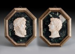 TWO ITALIAN BRONZE MOUNTED MARBLE RELIEF PORTRAITS OF ROMAN EMPERORS