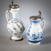 TWO GERMAN BLUE AND WHITE PAINTED FAIENCE JARS