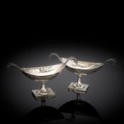 A PAIR OF NAVETTE SHAPED SILVER SALT CELLARS