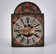 A SWISS WOOD WHEEL WALL CLOCK