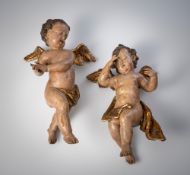A PAIR OF WINGED PUTTI